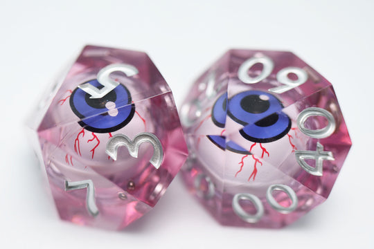 Sharp Edge Moving Eye RPG Dice Set - Bloodshot These super sharp edge dice are hand polished instead of tumbled to give them the shine without softening their edges. These dice are unique and each die in the set has a moving eye that's always looking up!  Perfect for Role Playing Games like Dungeons and Dragons (D&D), Shadowrun, Pathfinder, Warhammer, fantasy, sci-fi, or party games.   Details:  Set Type: 7 Piece RPG Set (D4, D6, D8, D10, D1%, D12, D20) Size: 16mm Material: Resin Color: Pink