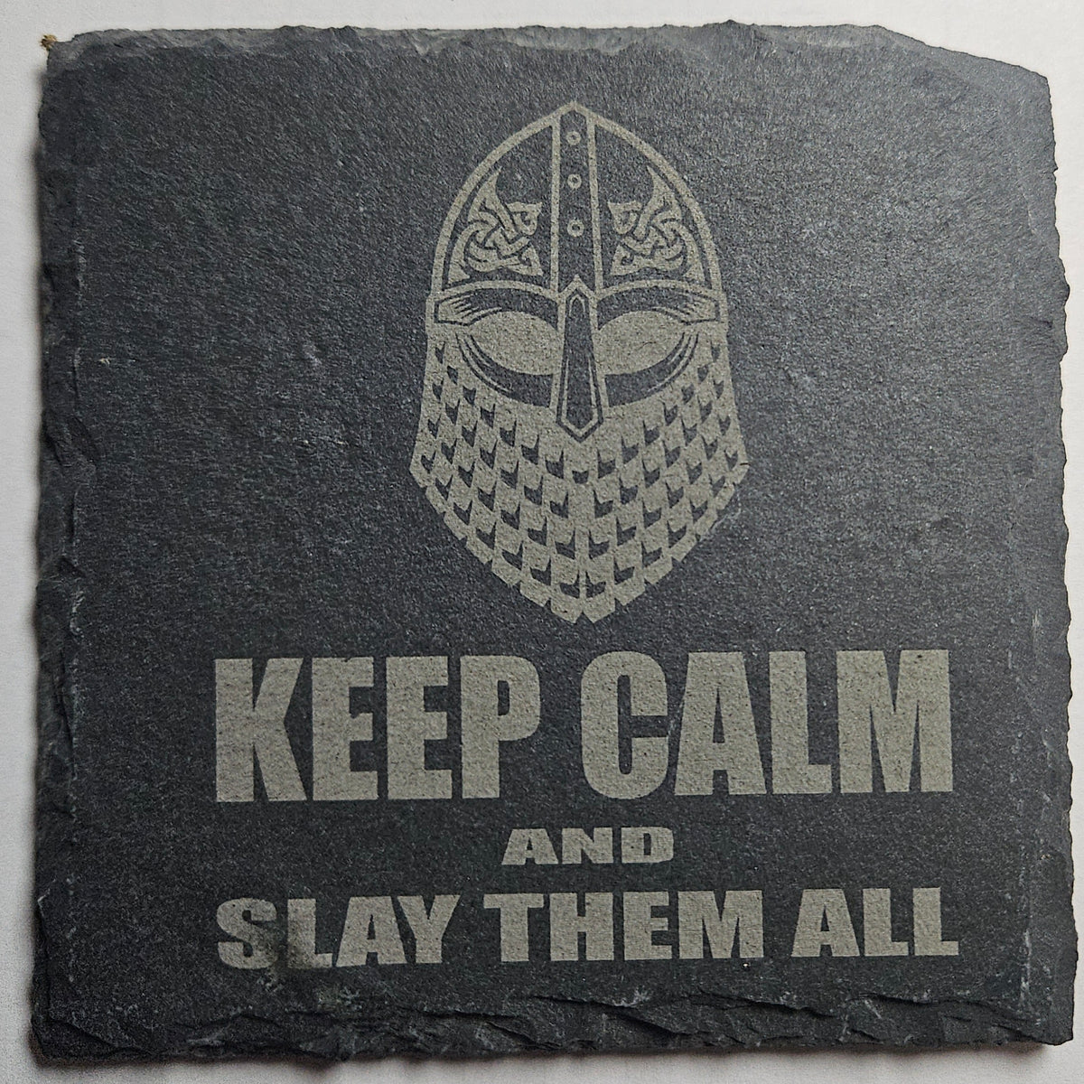 Slate coaster with a Viking helmet design and text 'Keep Calm and Slay Them All' on a white background.