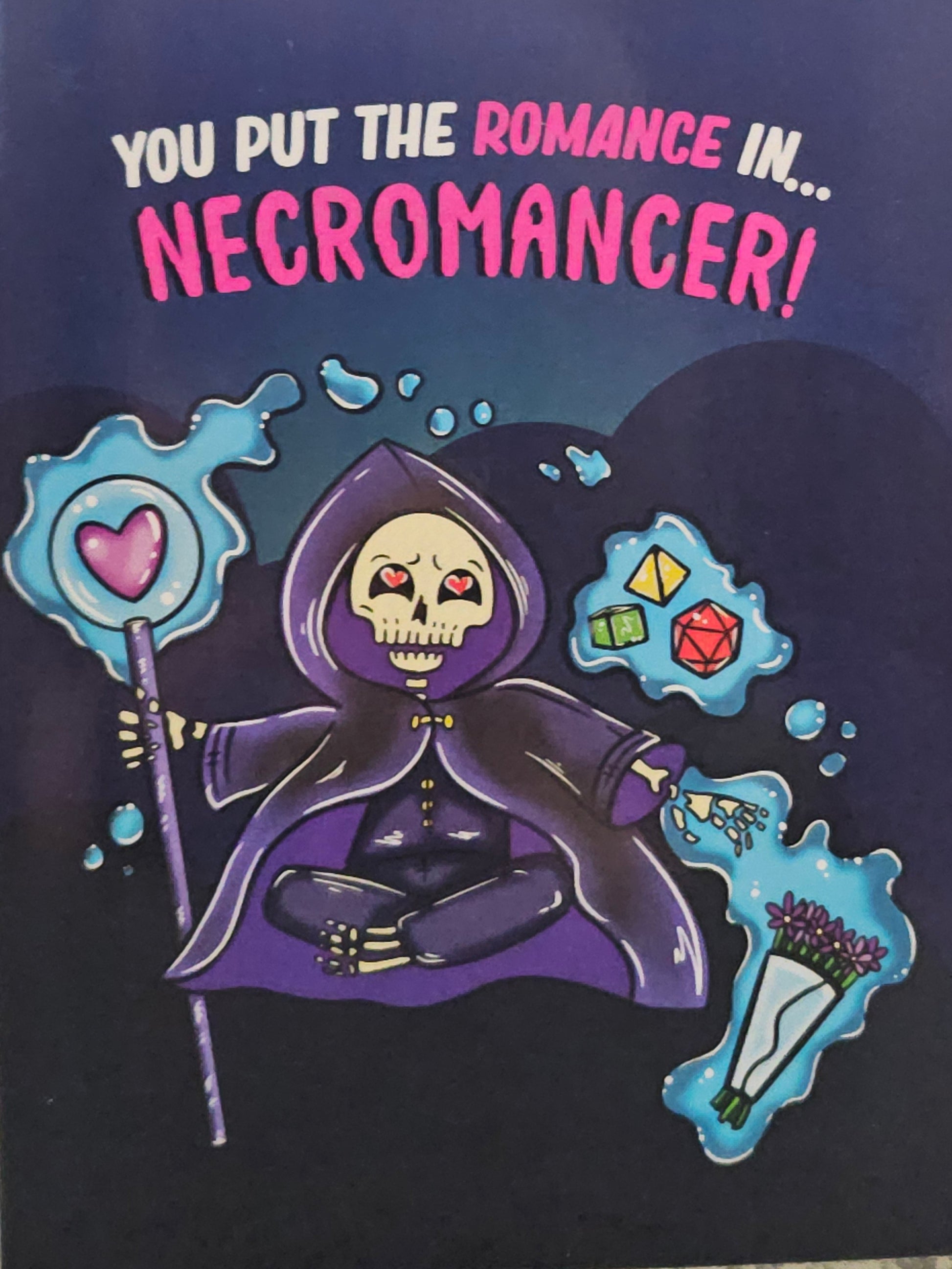 Card with a stylized skeleton in a purple robe and text 'YOU PUT THE ROMANCE IN... NECROMANCER!' on a dark background.
